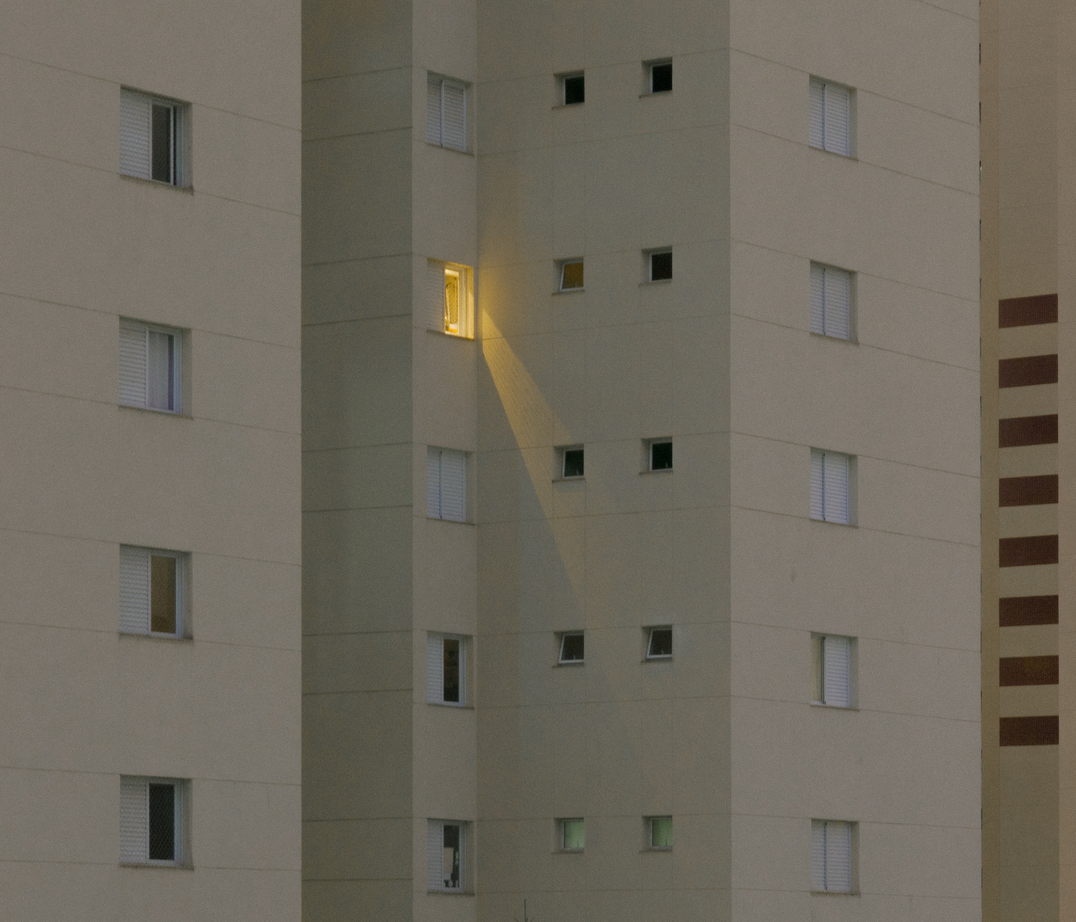 one window with lights on